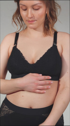 Model wearing Valeria nursing bra and Lemonie high waist in colour black showing how you can open the nursing bra