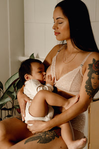 Mother breastfeeding her baby wearing Valeria nursing bra in colour rose