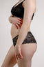 Side of model wearing Vienna nursing bra and Leia hipster in colour black