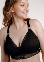 Load image into Gallery viewer, Model smiling wearing Vienna nursing bra in colour black
